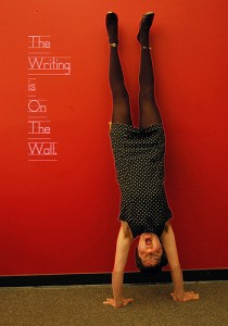 yoga handstand on a wall 